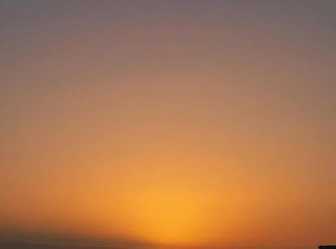 Sunset Over The Sea Плая-де-лас-Америкас